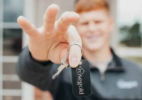 selling your home with Rosegold - person holding a key